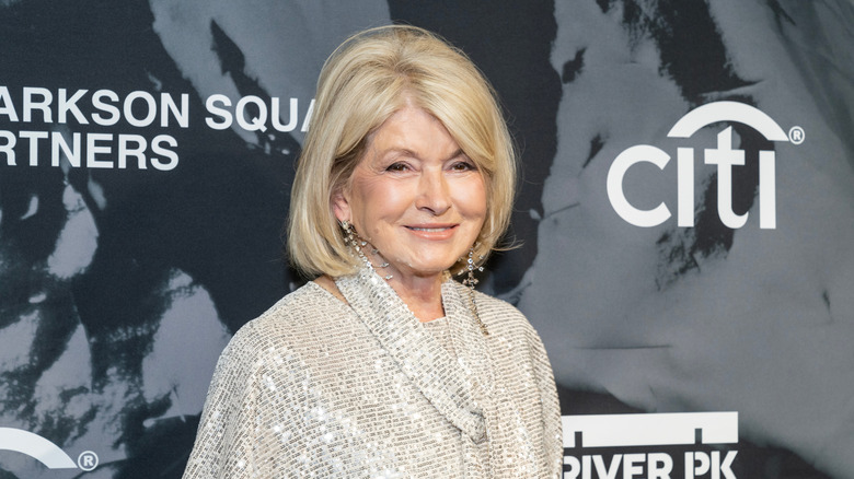 Martha Stewart wearing a silver top in front of a step-and-repeat